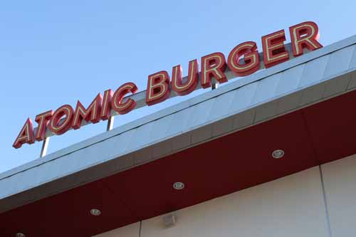 Exterior Signage Atomic Burger Against the Sky